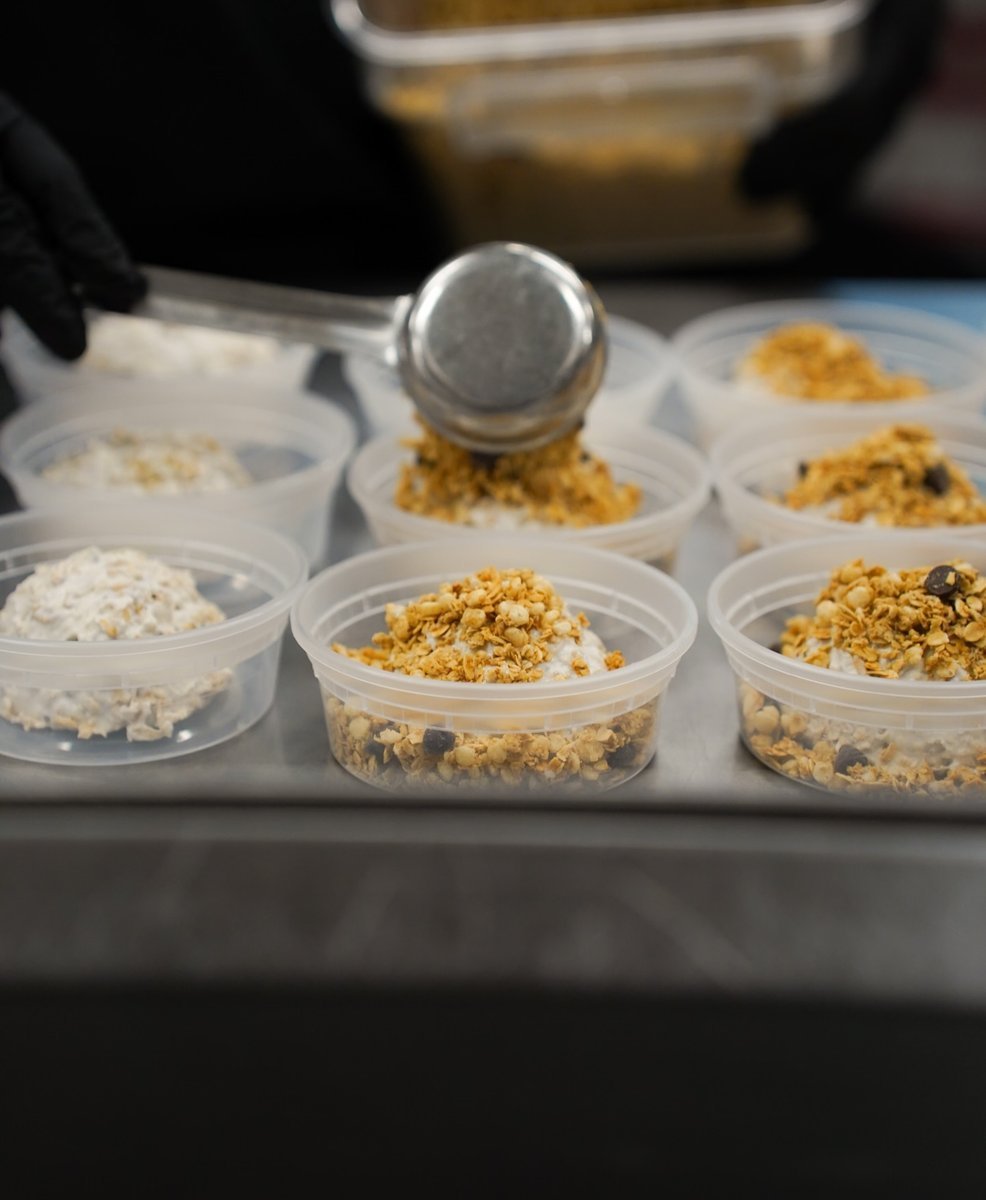 Fresh Fit Meals team preparing packaged meals
